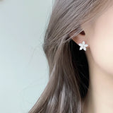 Pear Shape Moissanite Flower Stud Earrings in 10K White Gold